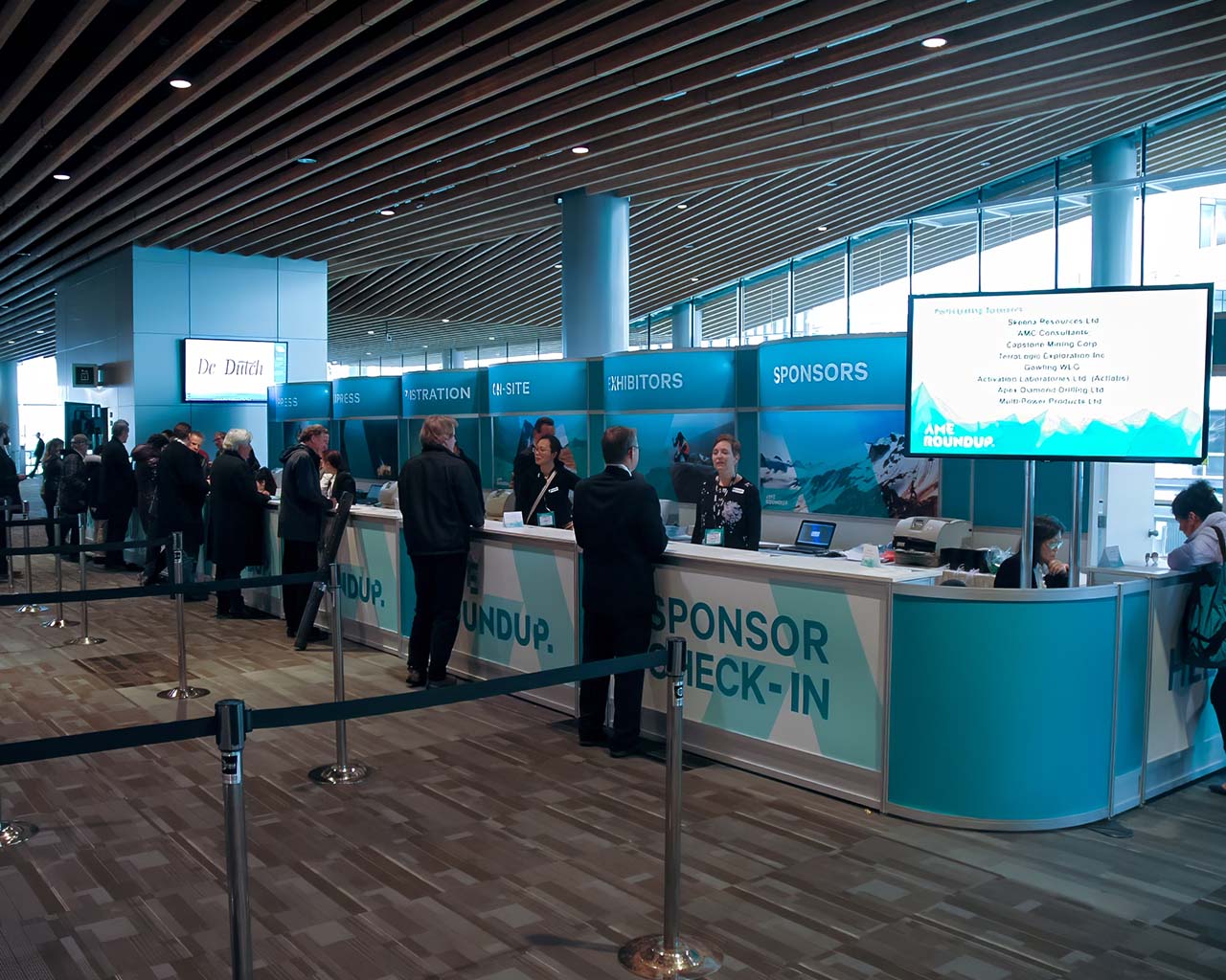 Custom Octanorm Reception desk at Vancouver Convention Centre