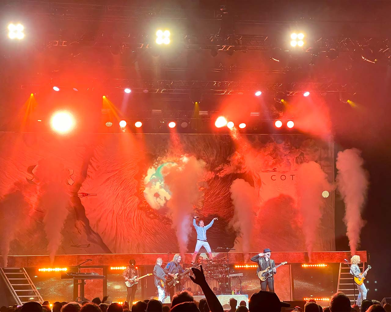 Styx on stage with red lighting